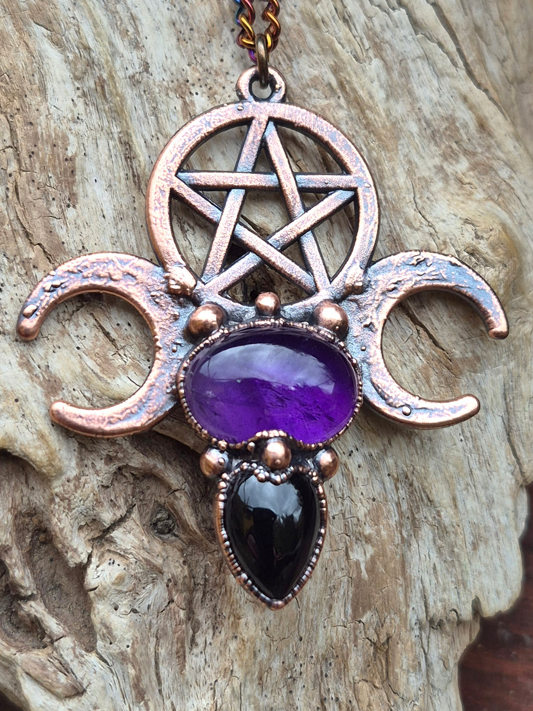 Grimorio con triplice luna